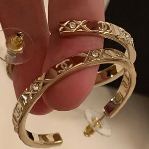 Authentic gorgeous 2 inches golden Chanel hoops with CC logo and crystals.Limit